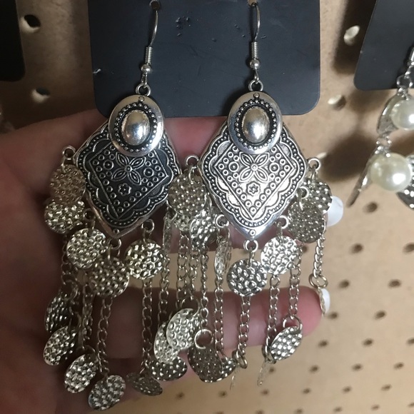 Indian style earrings w/multiple hammered discs.